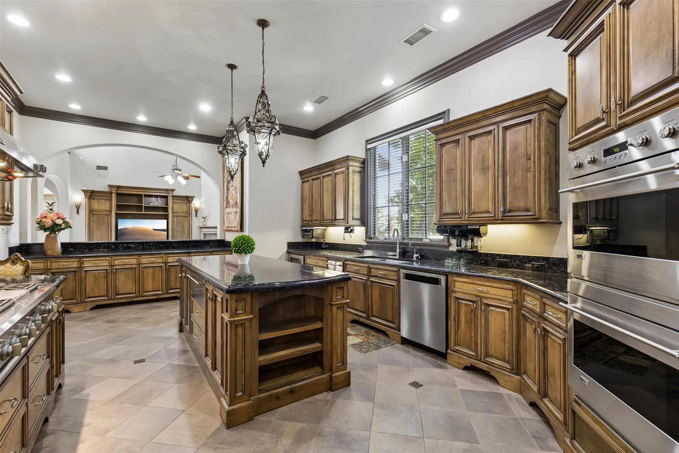 Built-in refrigerator and plenty of cabinetry