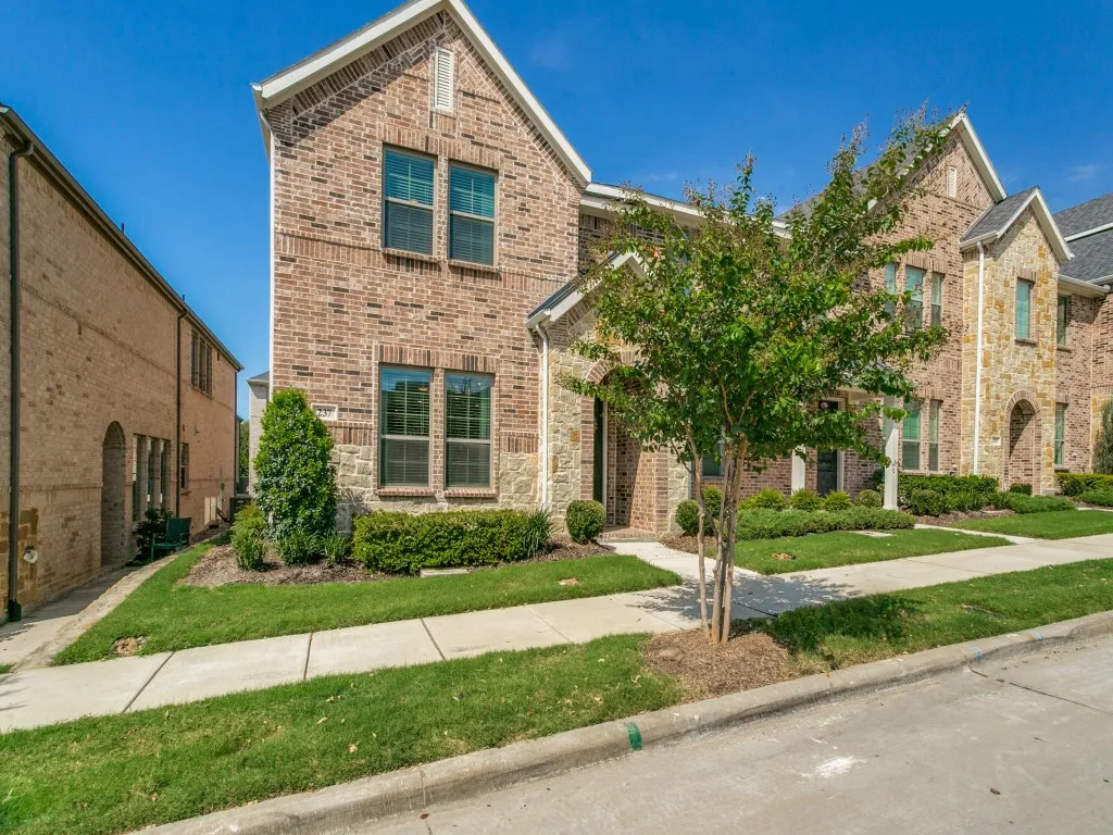 Brick and stone veneer exterior with gabled roofline