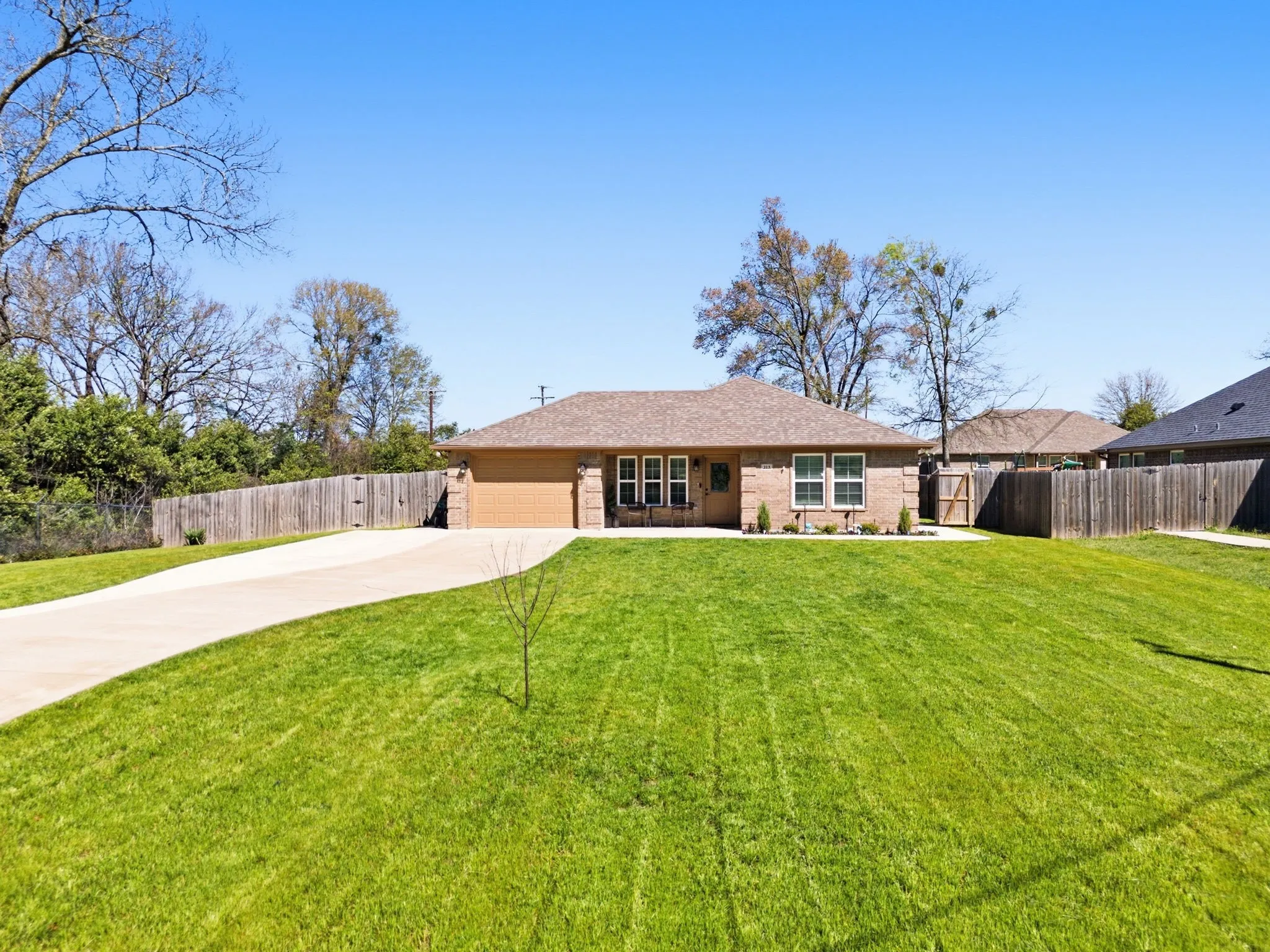 Brick exterior with attached garage