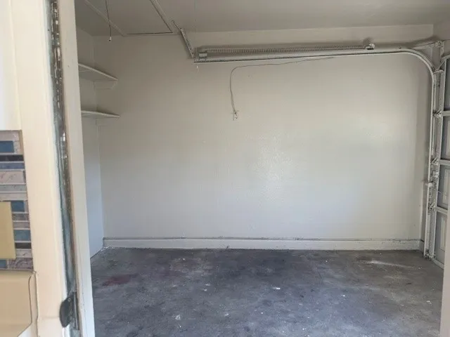 Garage partially converted into third bedroom