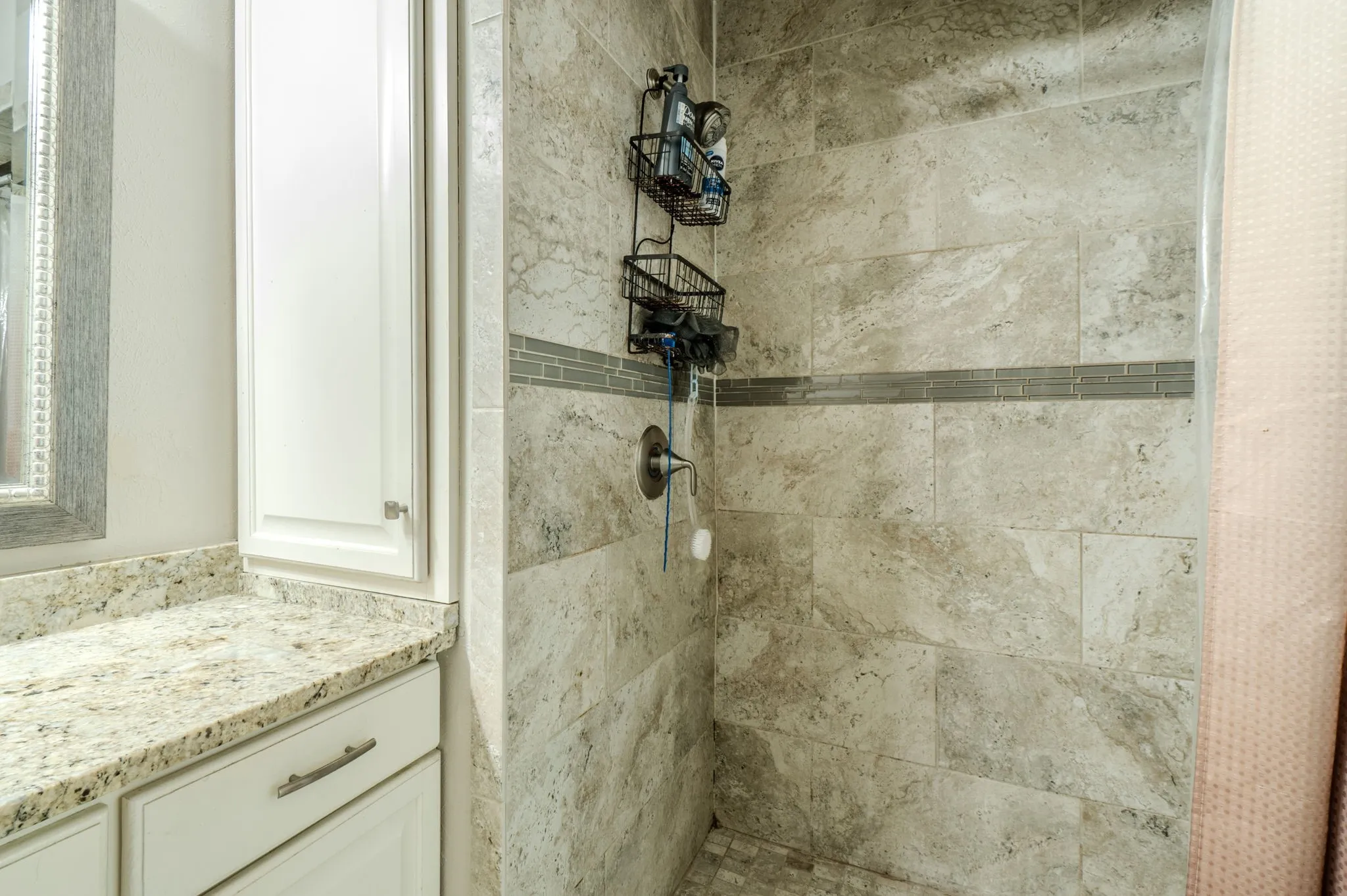 Granite-finish countertop with a rectangular under-mount sink