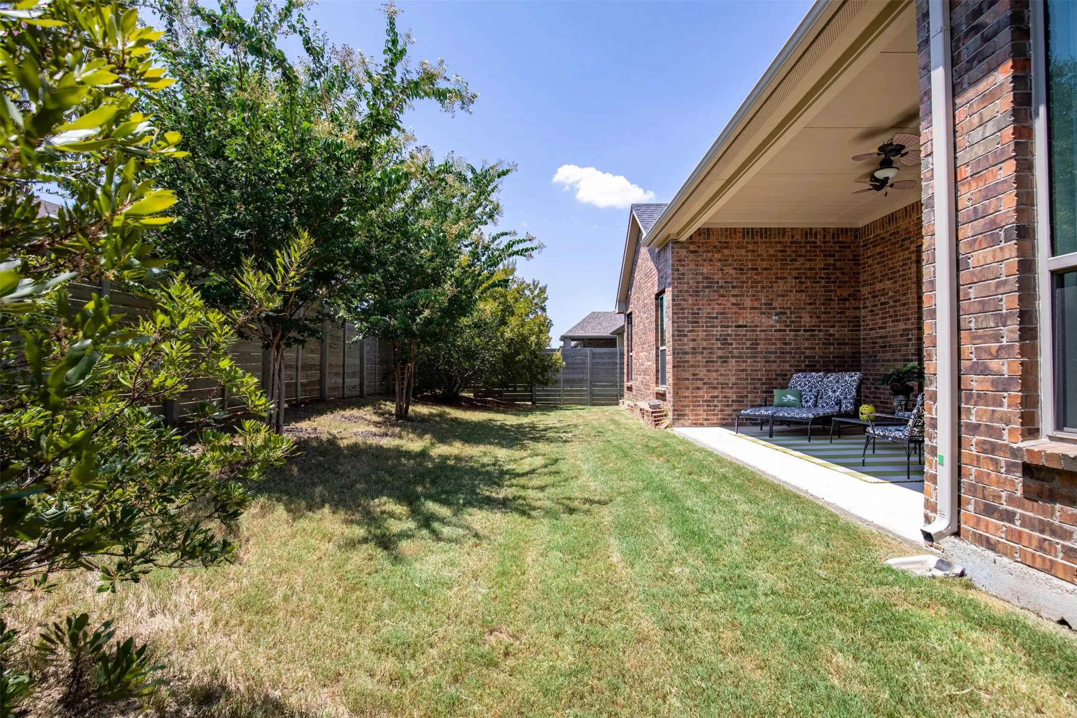 Room for garden beds, a playset, trampoline, and family pets.
