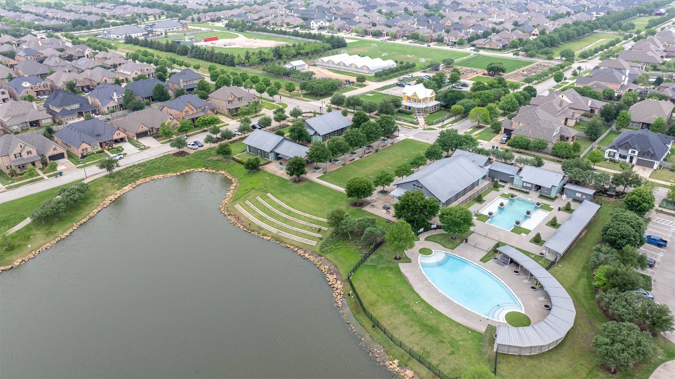 Harvest has incredible amenities including resort style pools located next the lake.