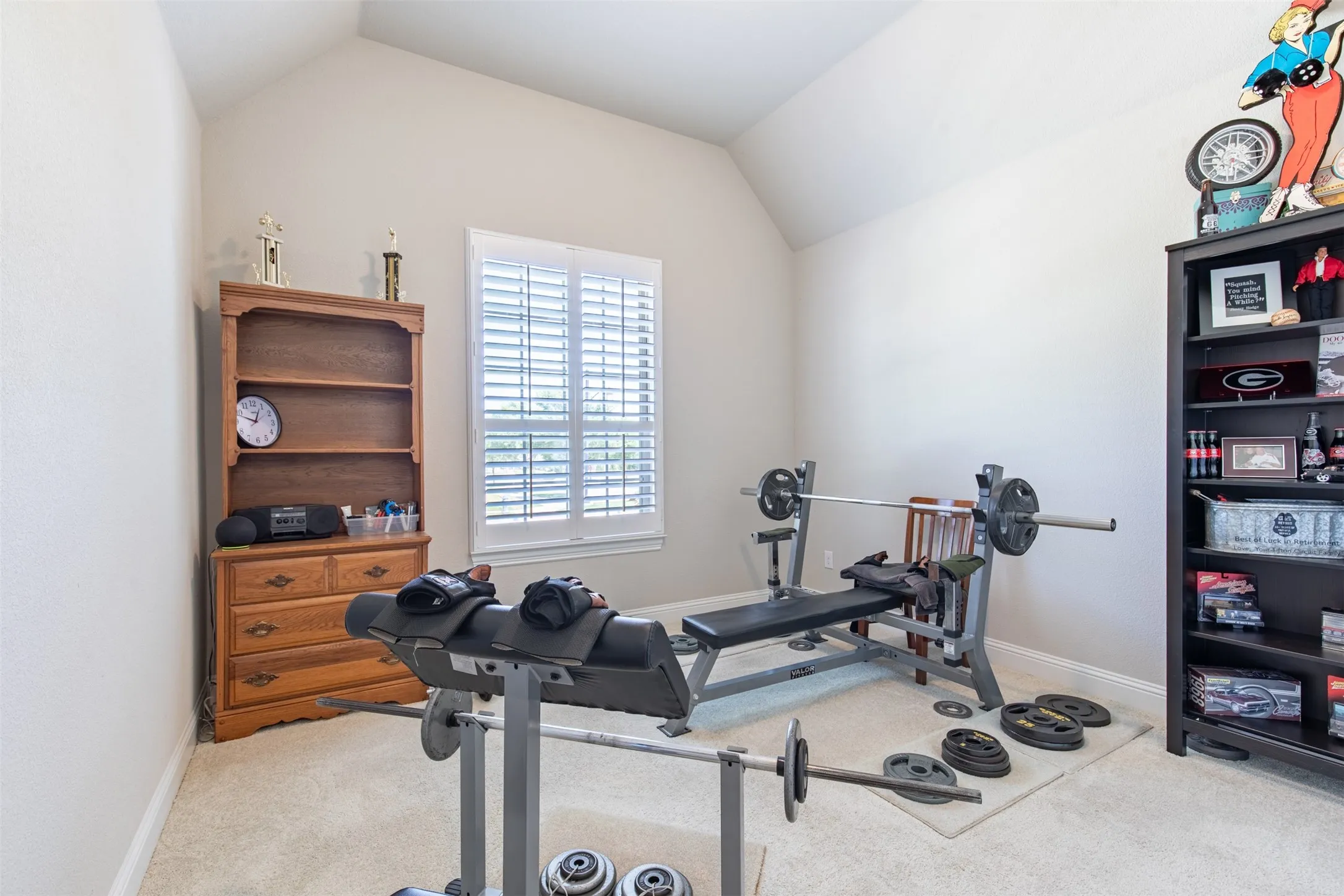 Secondary bedroom at the front of the house is currently being used as a gym.