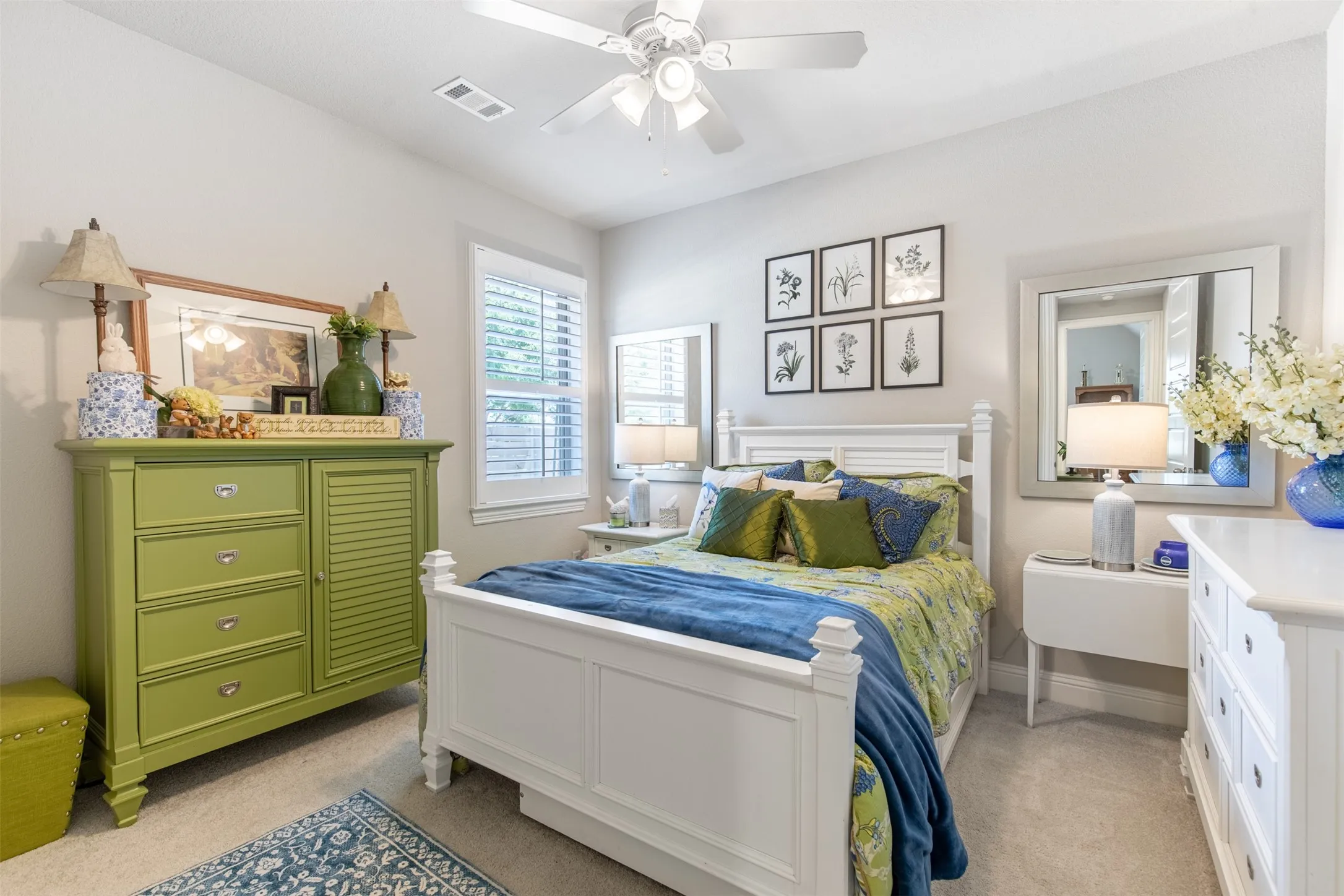 Large, secondary guest bedroom towards the front of the home.