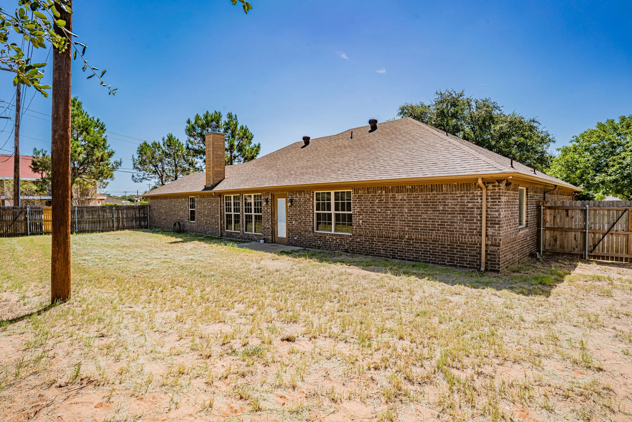 Large back yard with privacy fence