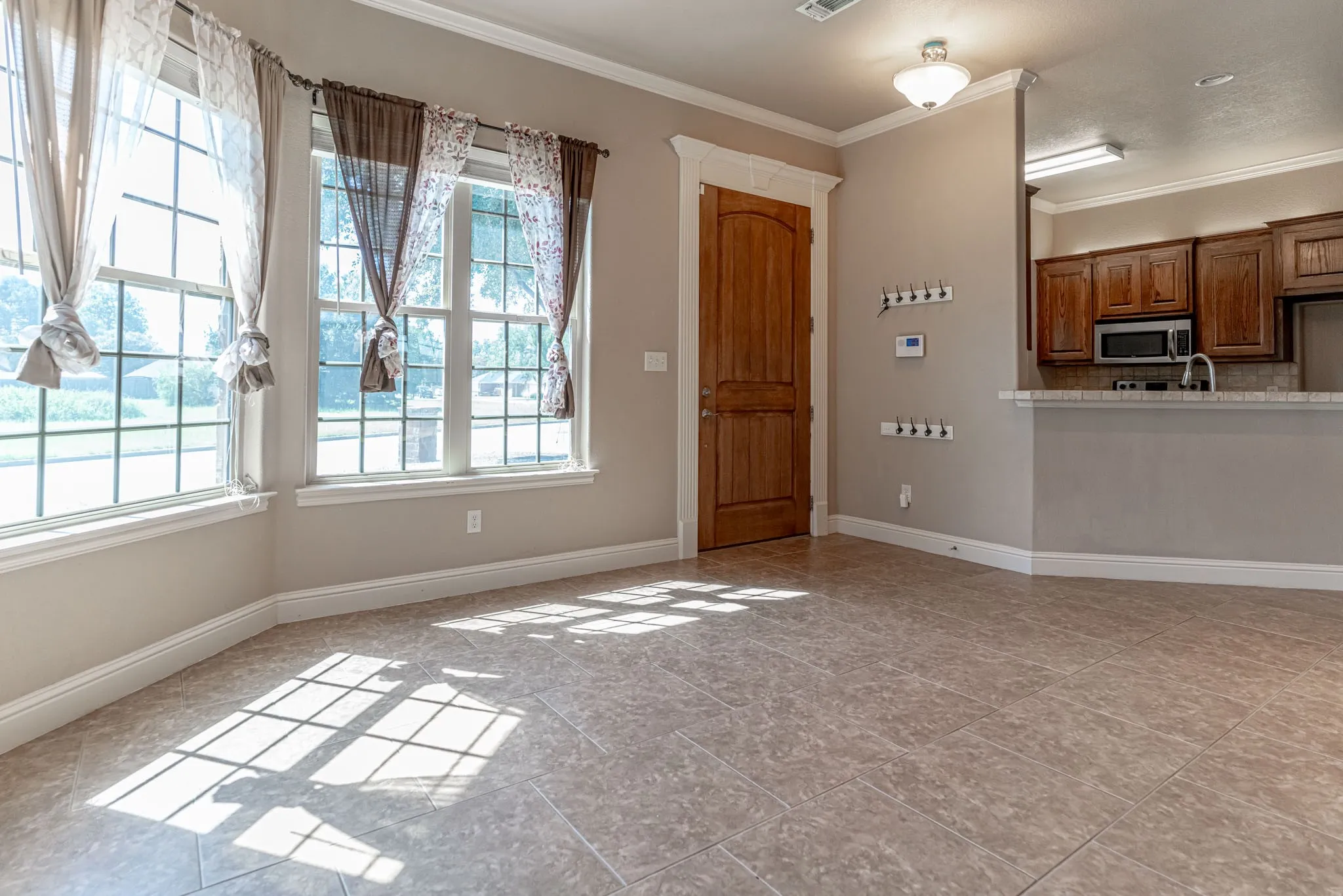 Front door with view into kitchen