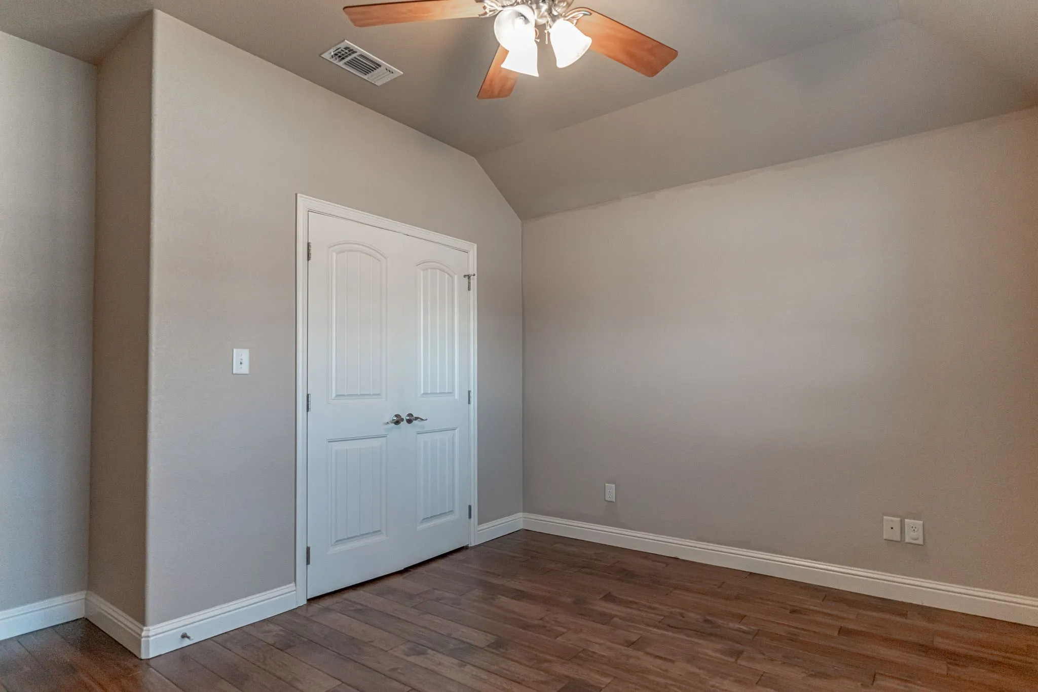 Secondary bedroom with double door closet