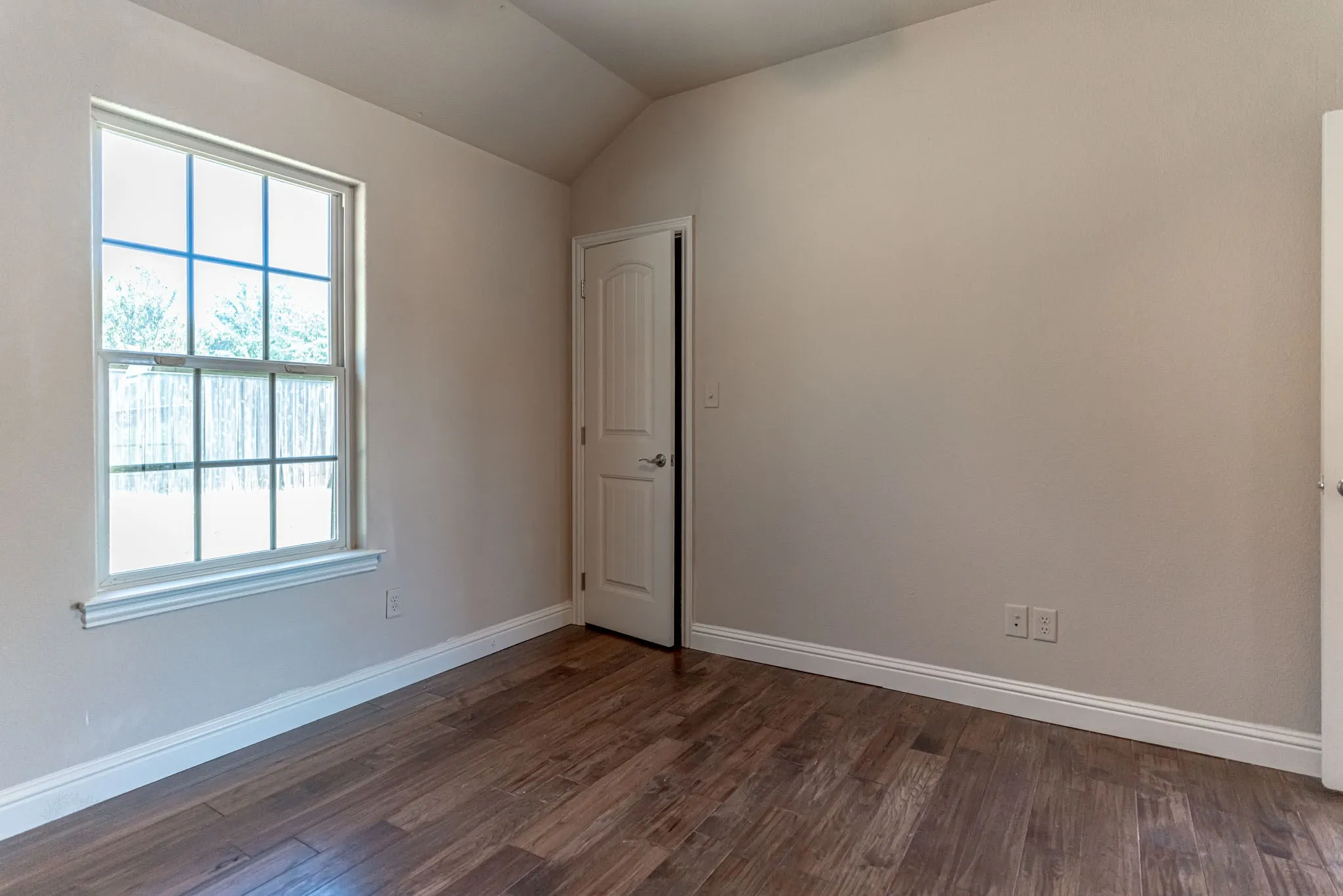 Secondary bedroom with walk in closet