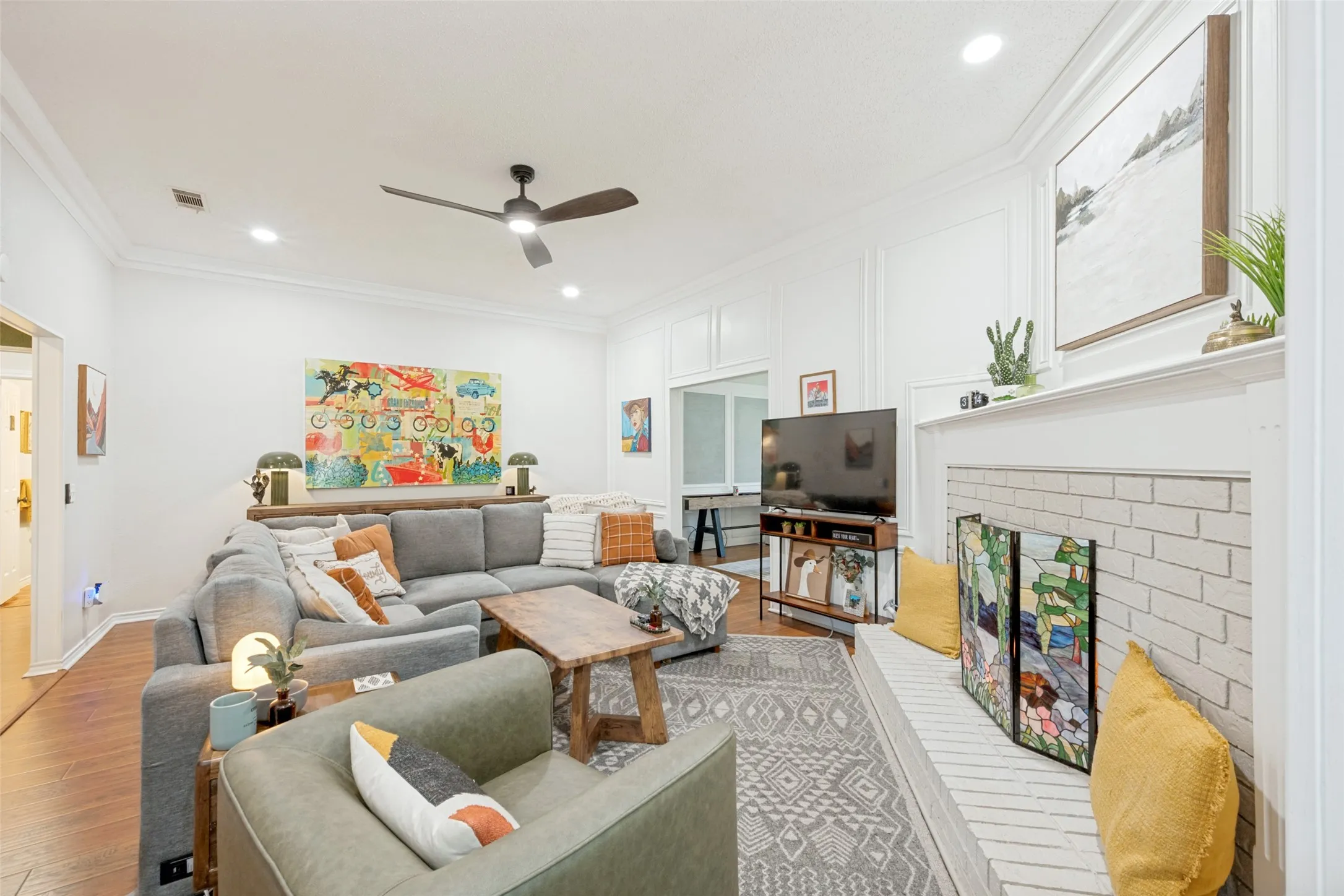 Gorgeous hearth and fireplace in this cozy living space.