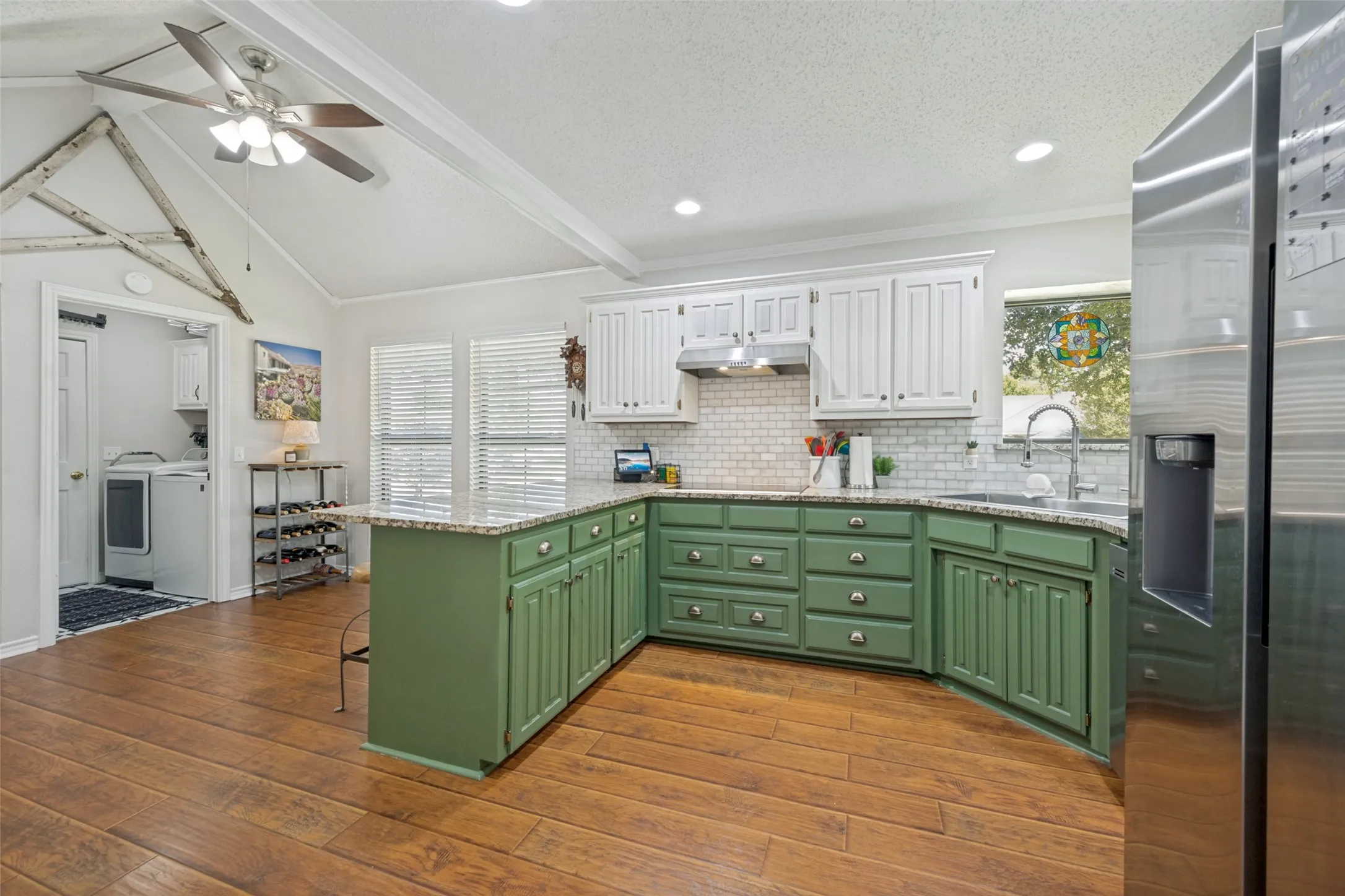 Tons of prep space and again the open floor plan, to the breakfast area and dining and laundry.