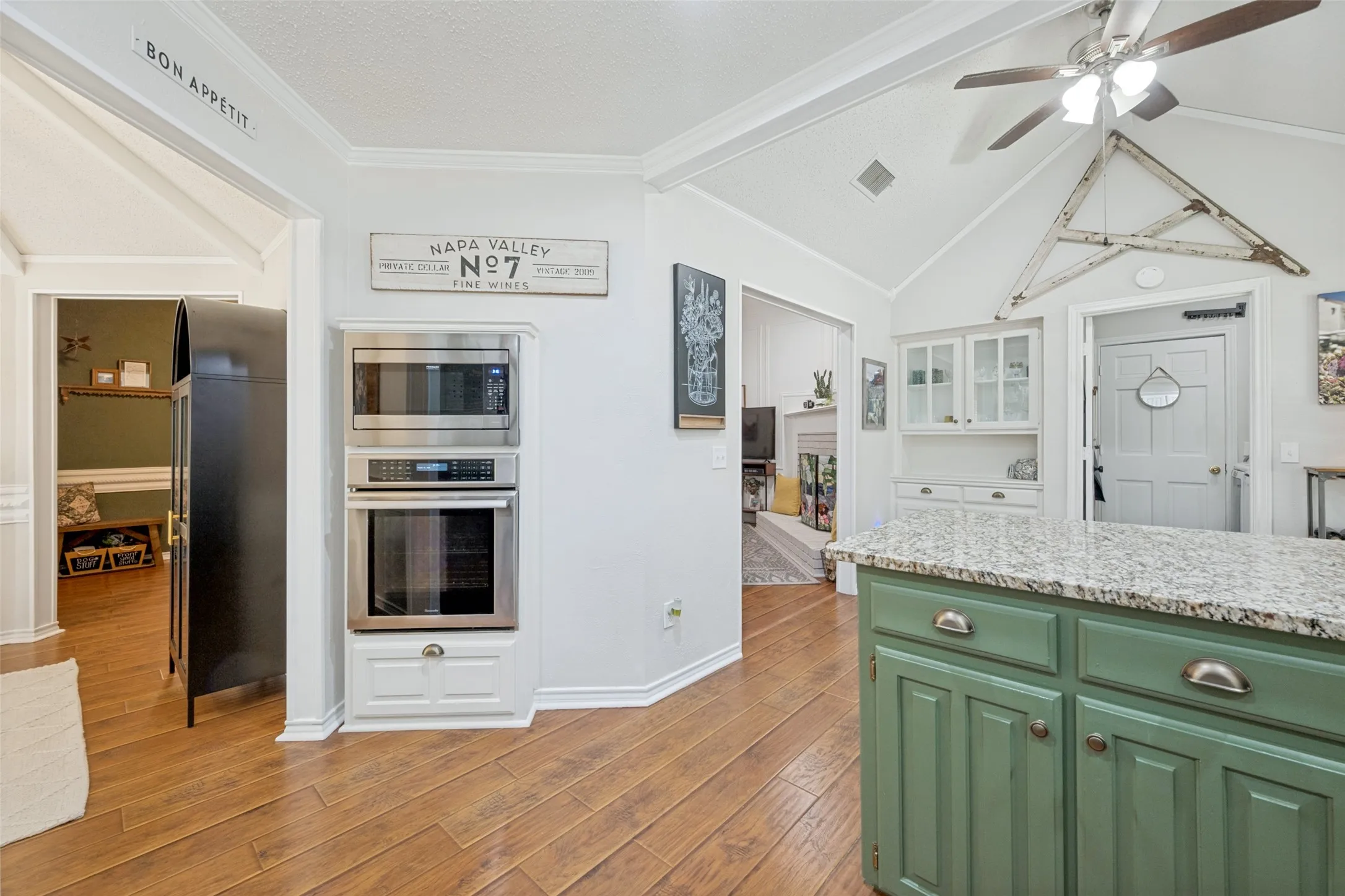 Recent oven and microwave and the built in hutch in the breakfast area provides additional space for dishes and display of serving pieces.