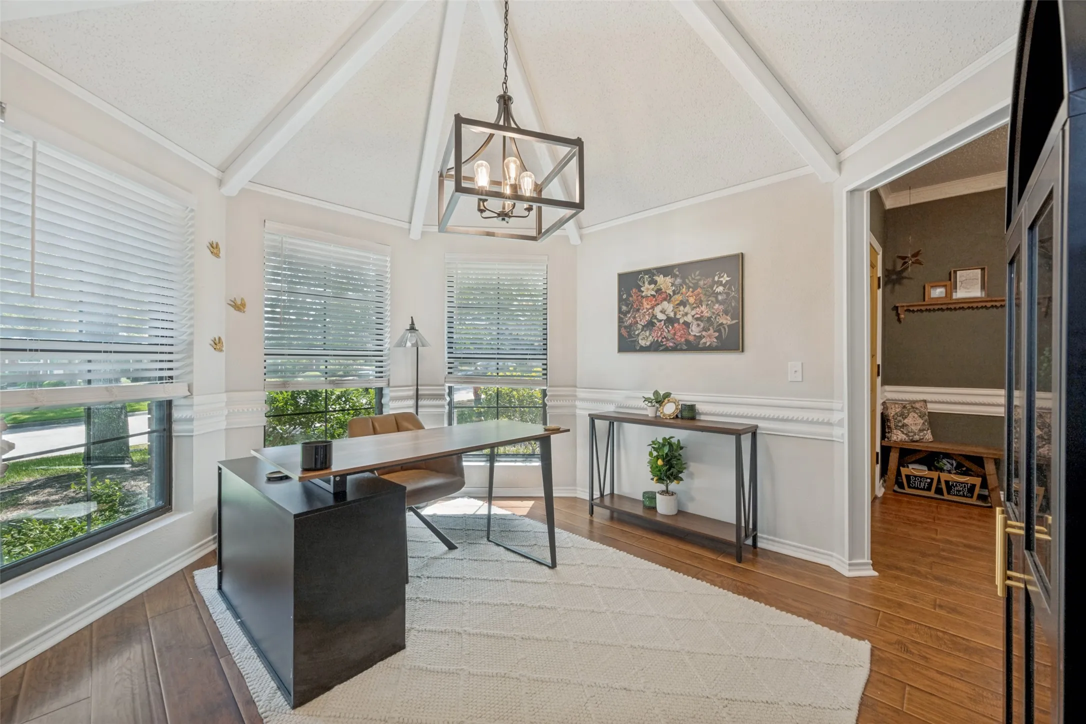 Formal Dining with bay windows, currently being used as an office