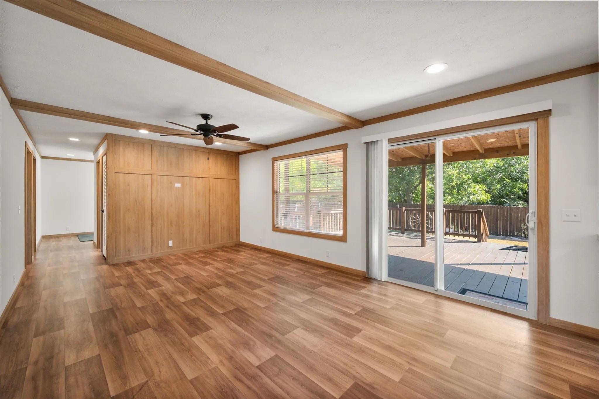 Versatile second living/dining area features exterior access, large window, ceiling fan and plenty of room for relaxing or entertaining.
