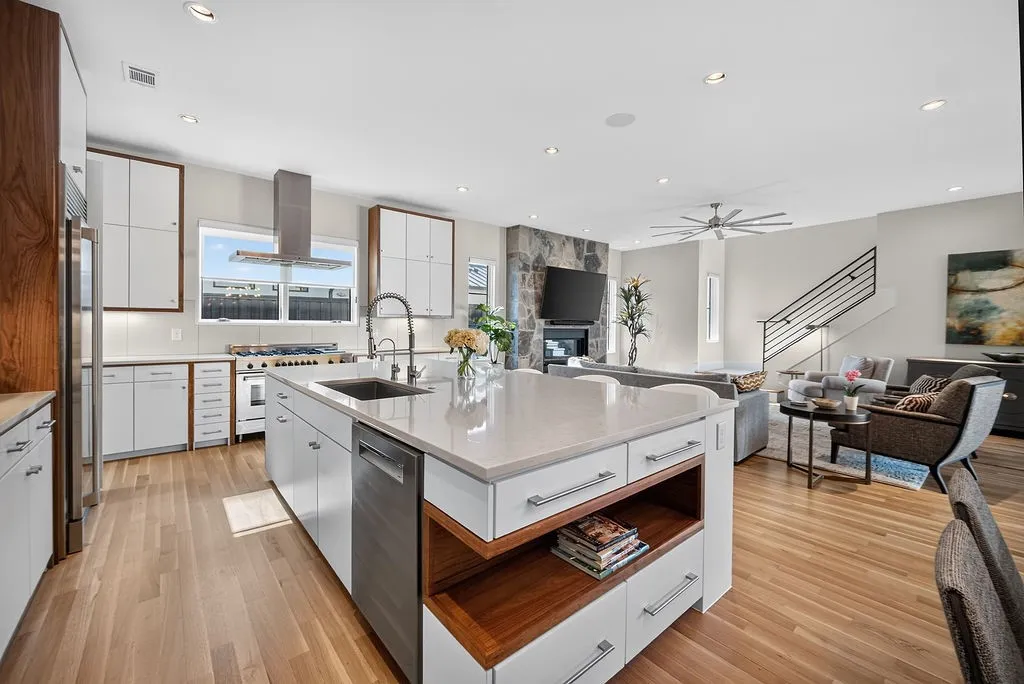 Custom cabinetry and a walk-in pantry keep every tool organized and within reach