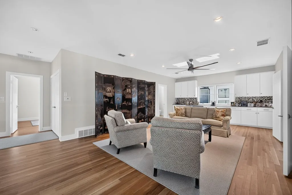 The upstairs game room features its own wet bar, creating a dedicated second hub for fun