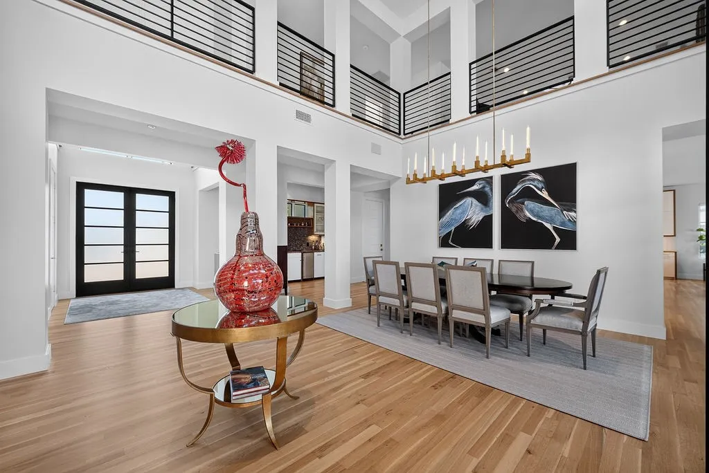 Positioned right off the main foyer, the formal dining room easily handles large gatherings and holiday meals