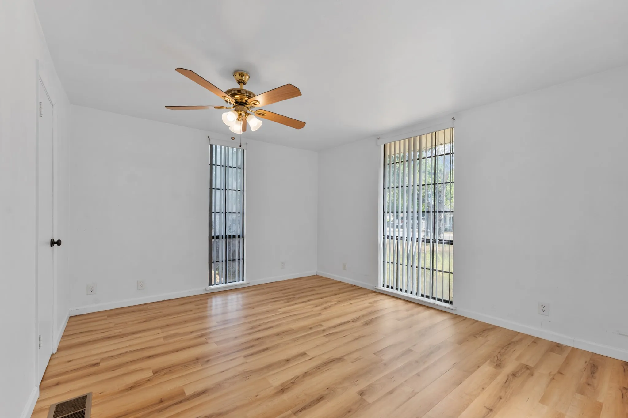 Wood-finish flooring with white walls
