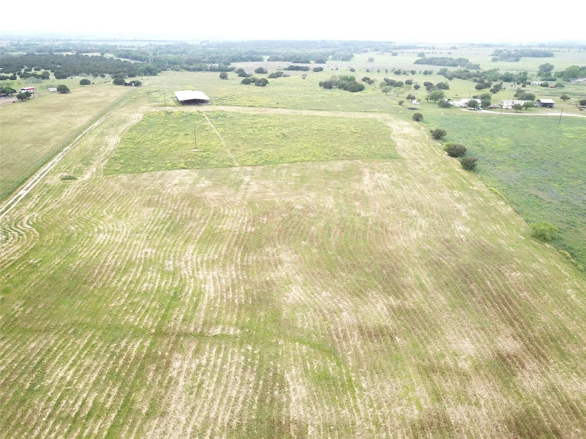 Birds eye view of property featuring a rural view
