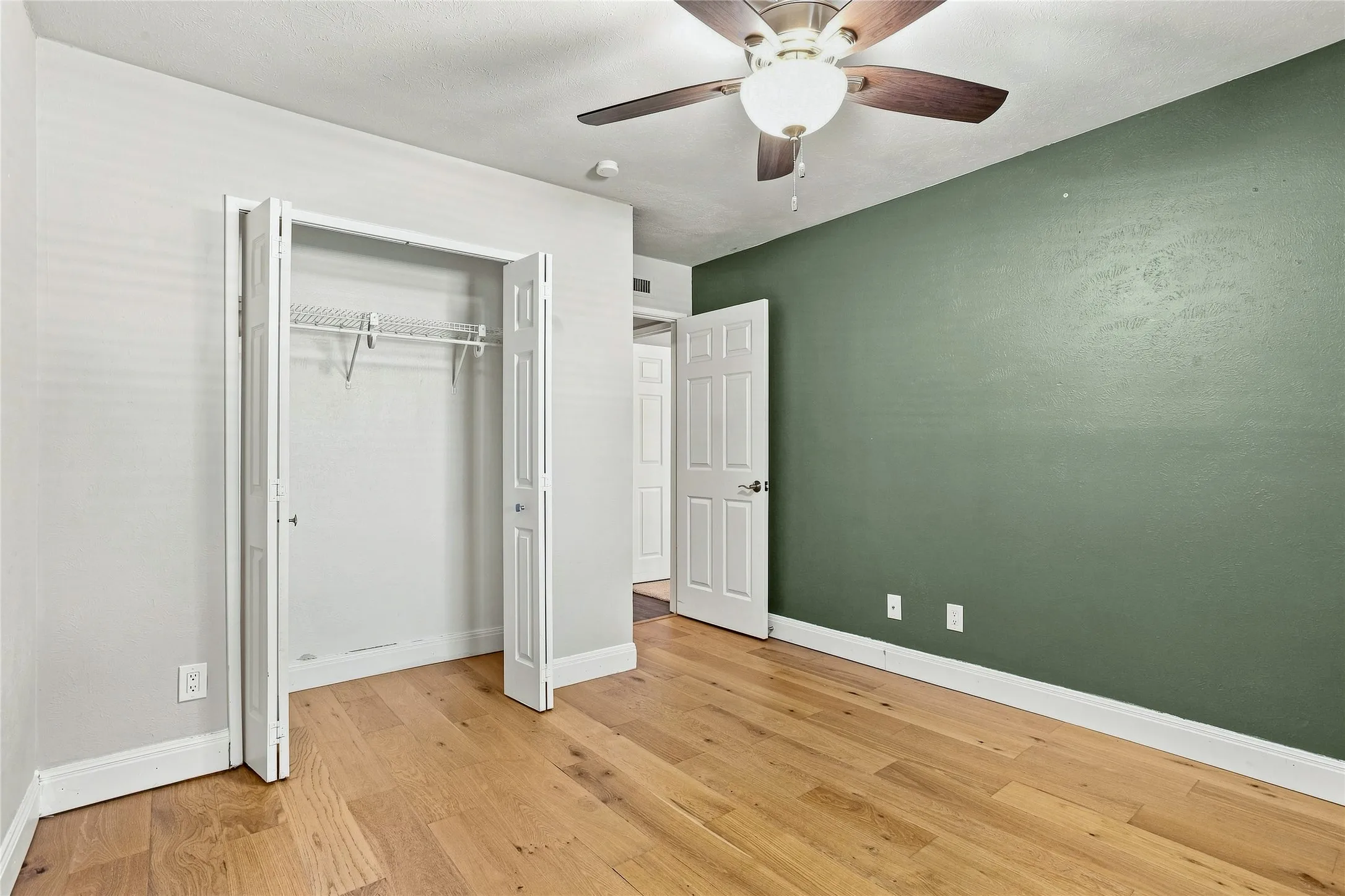 Bedroom with Luxury Vinyl Plank floors