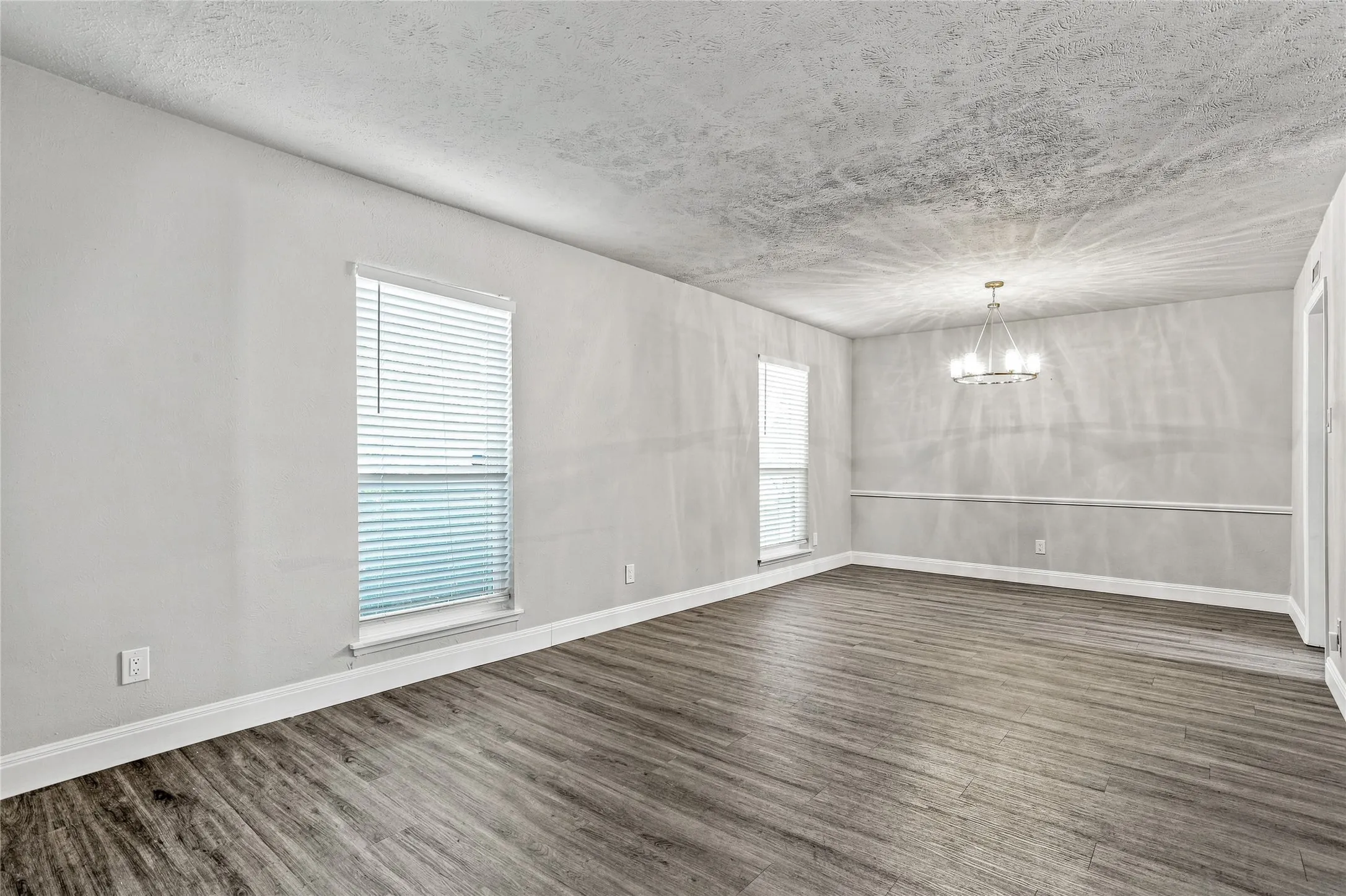 Living Room & Dining Room with updated lighting