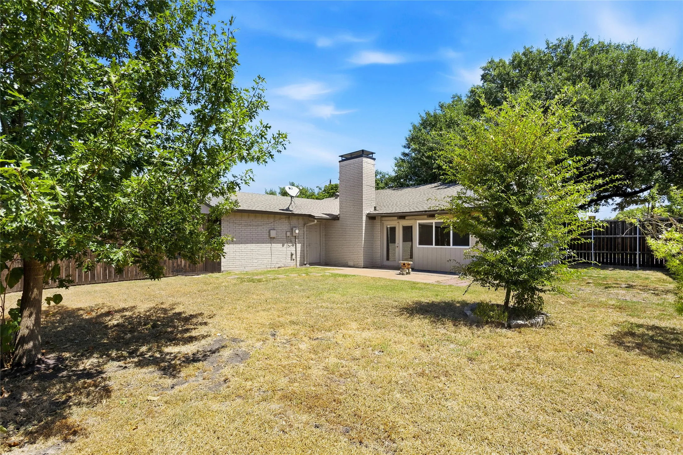 Two Car Garage off of the backyard