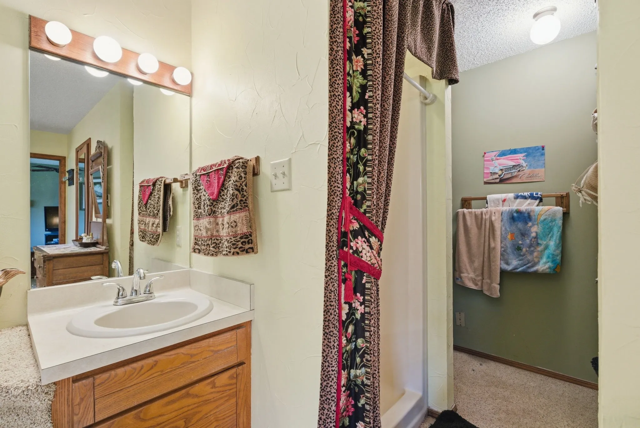 Vanity with an integrated sink and chrome fixtures
