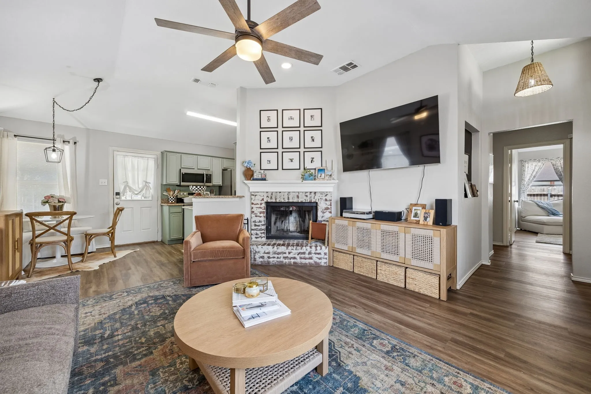 Vaulted ceilings with a ceiling fan and recessed lighting