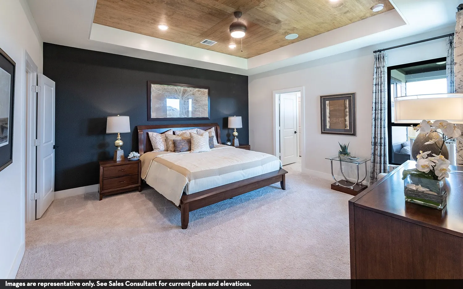 Tray ceiling with wood-finish paneling and recessed lighting