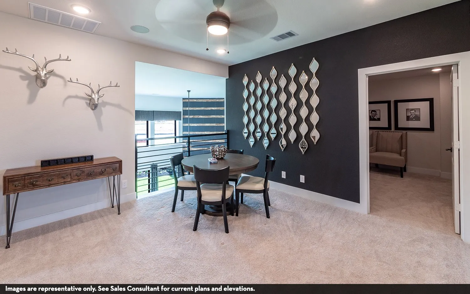 Recessed lighting, ceiling fan, carpeted flooring, dark accent wall, and open railing