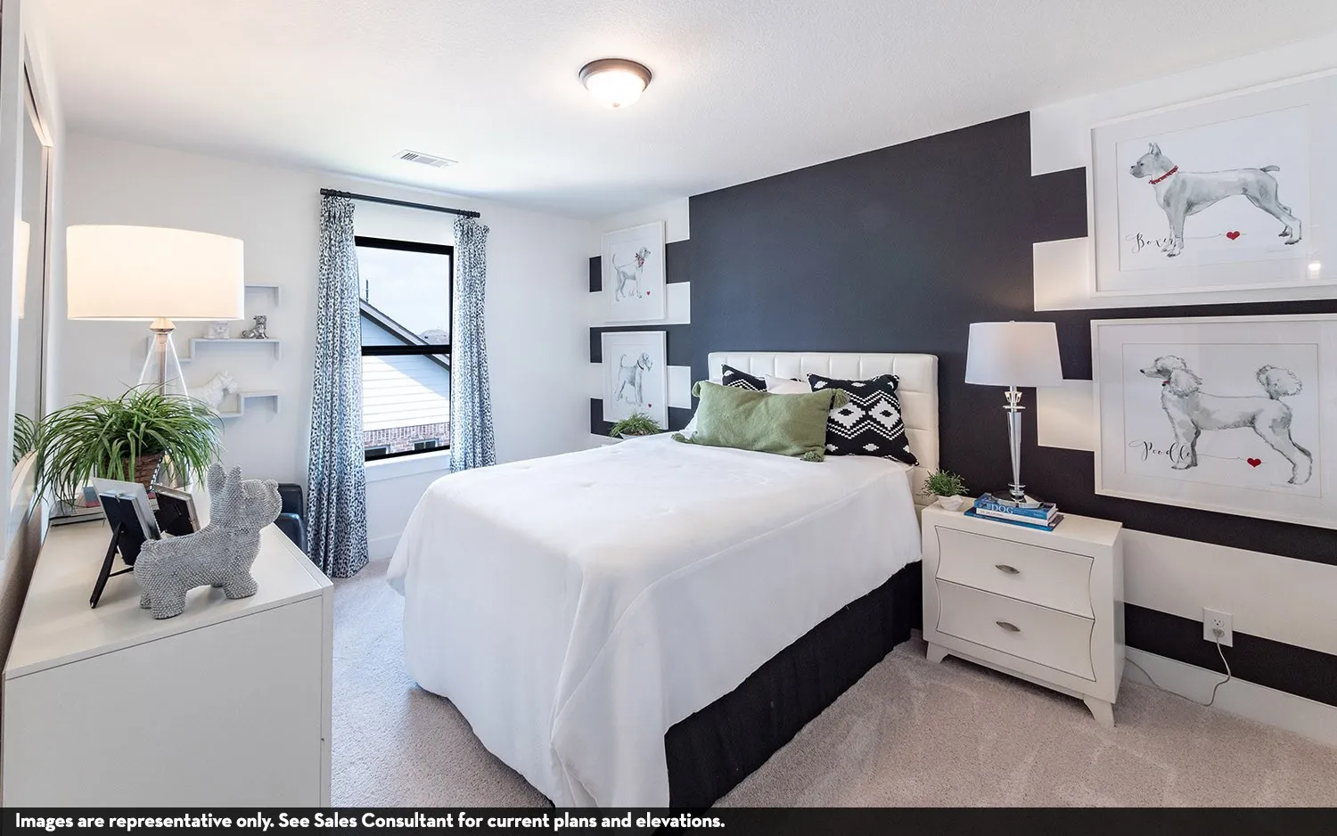 Carpeted flooring, window with dark trim, recessed ceiling light, white dresser, and patterned accent wall