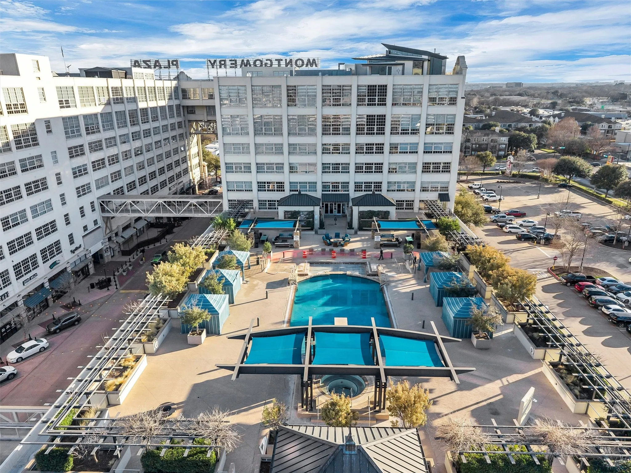 Ultimate outdoor lifestyle hub with resort-caliber amenities including a resort-style pool, shaded cabanas, fire pits, and ample lounge space right outside your door.