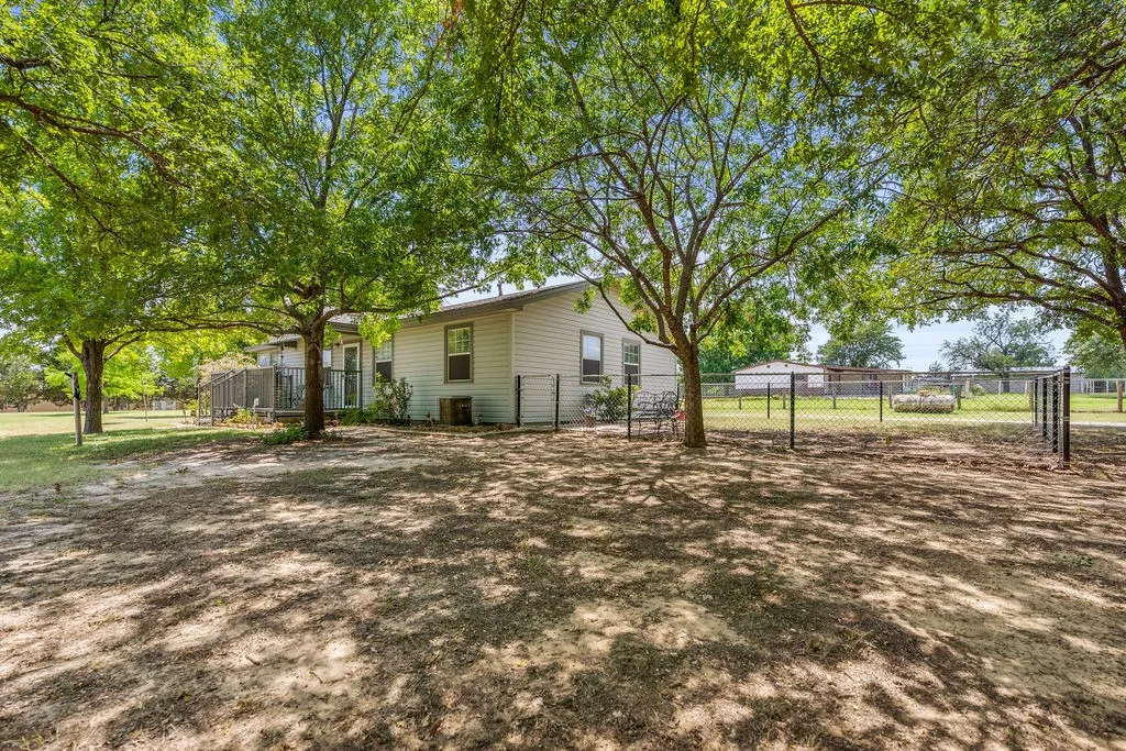 Side yard with chain link fence