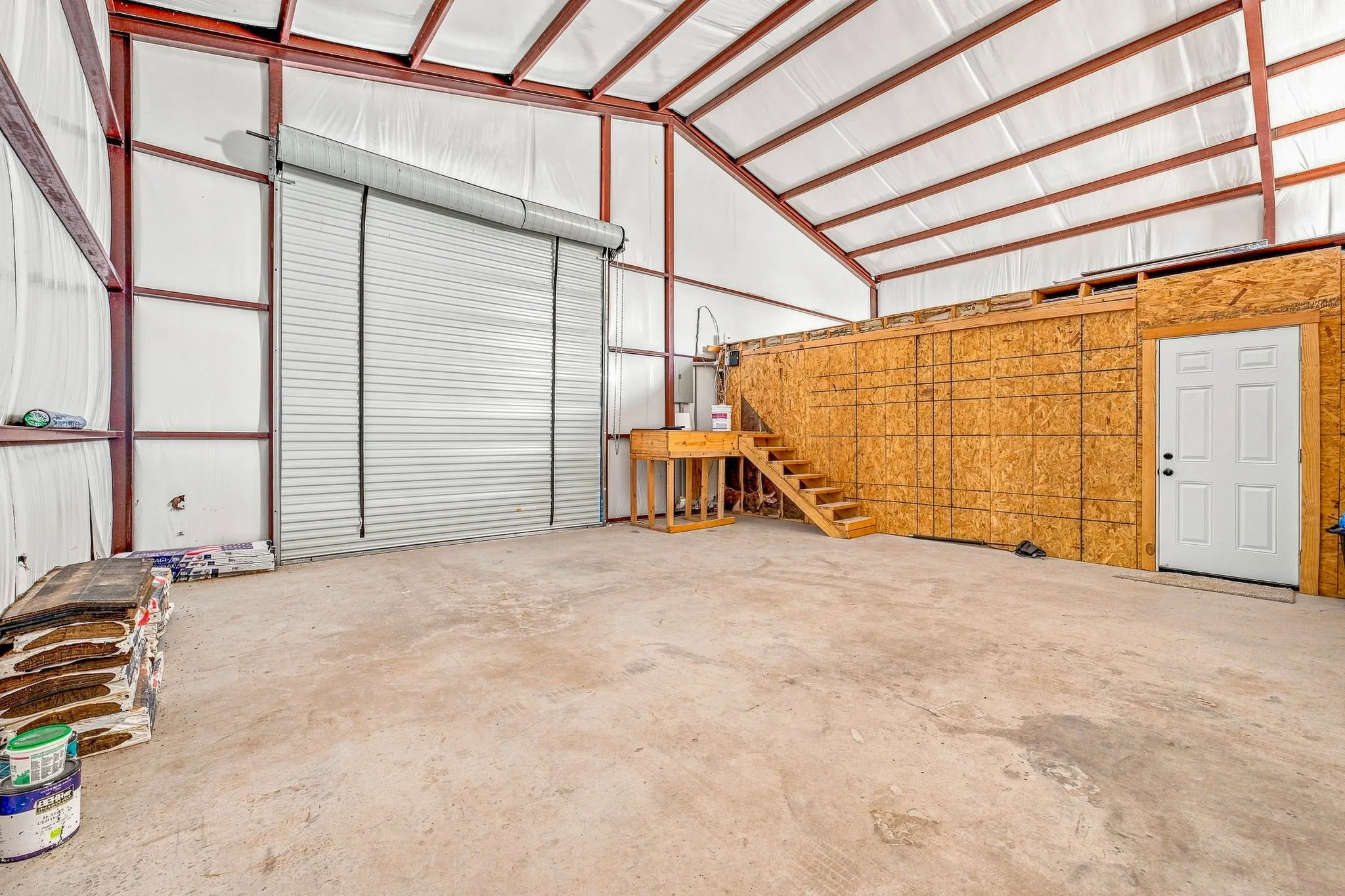 High-ceiling interior with exposed steel beams