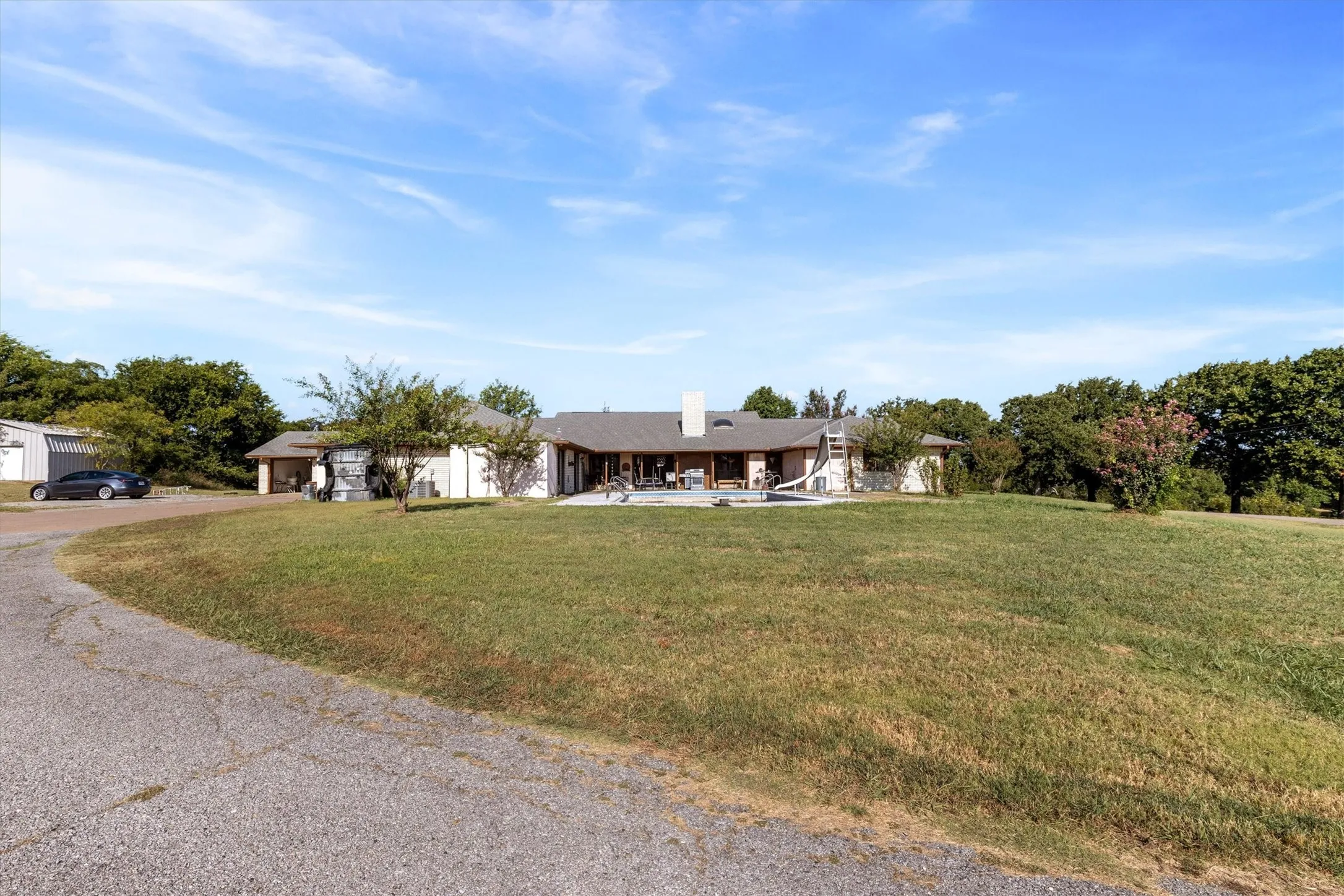Commanding street presence with timeless curb appeal.