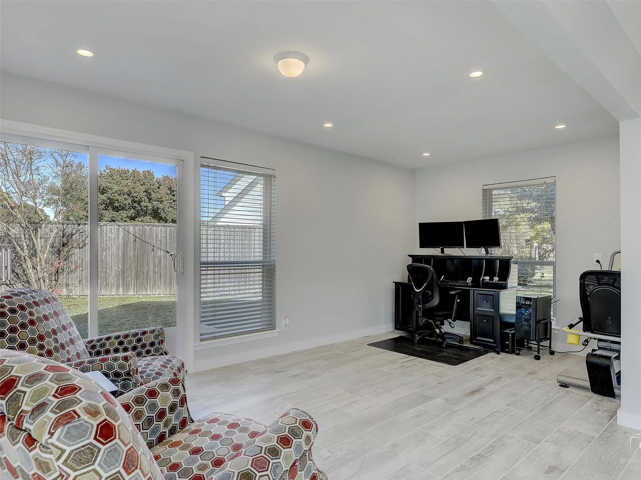 Office space featuring light wood-type flooring