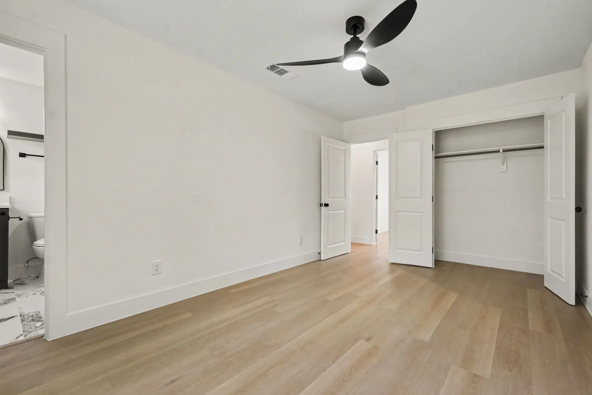 Bedroom with full bathroom.