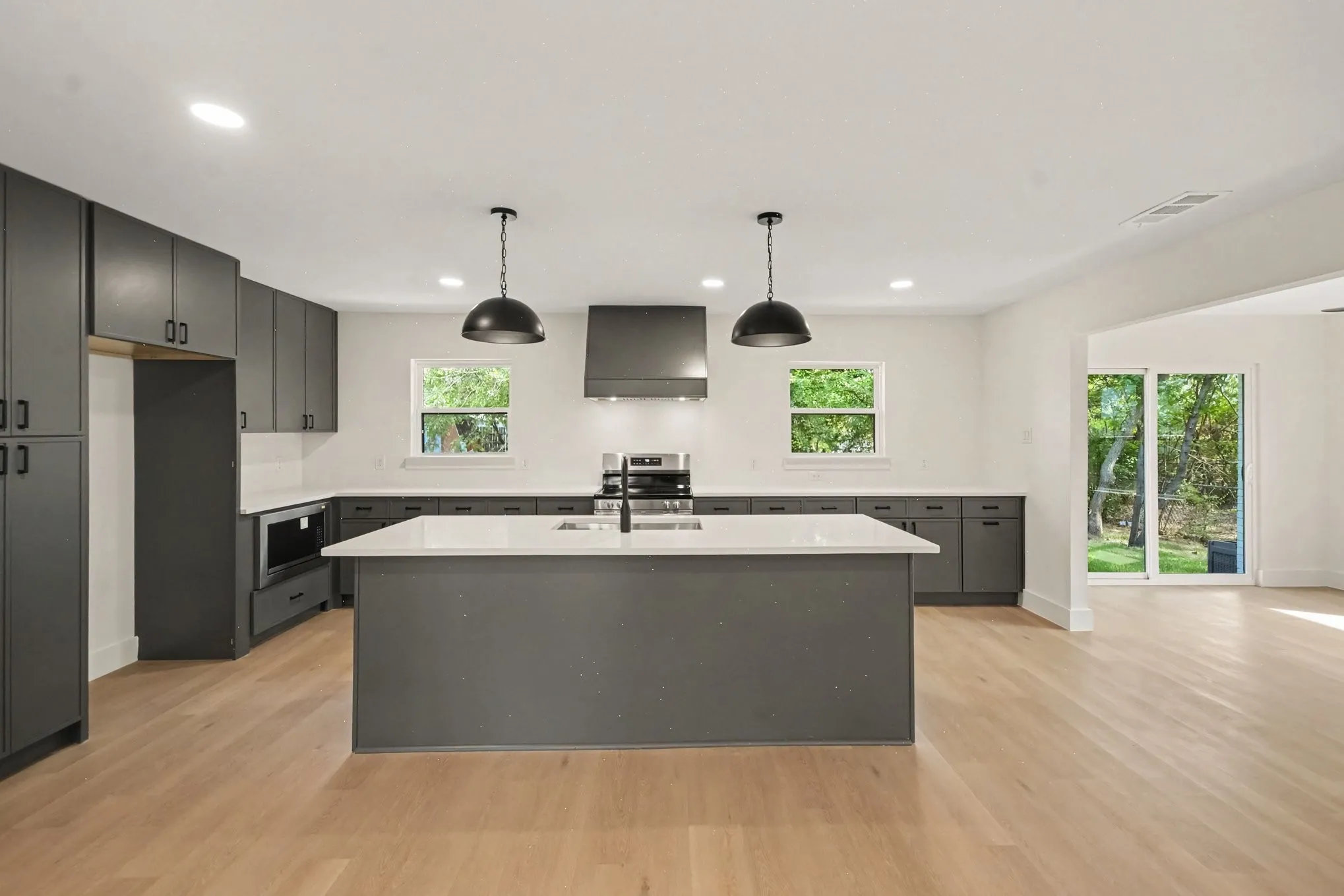 Brand new kitchen complete with island and lots of cabinet and storage space!