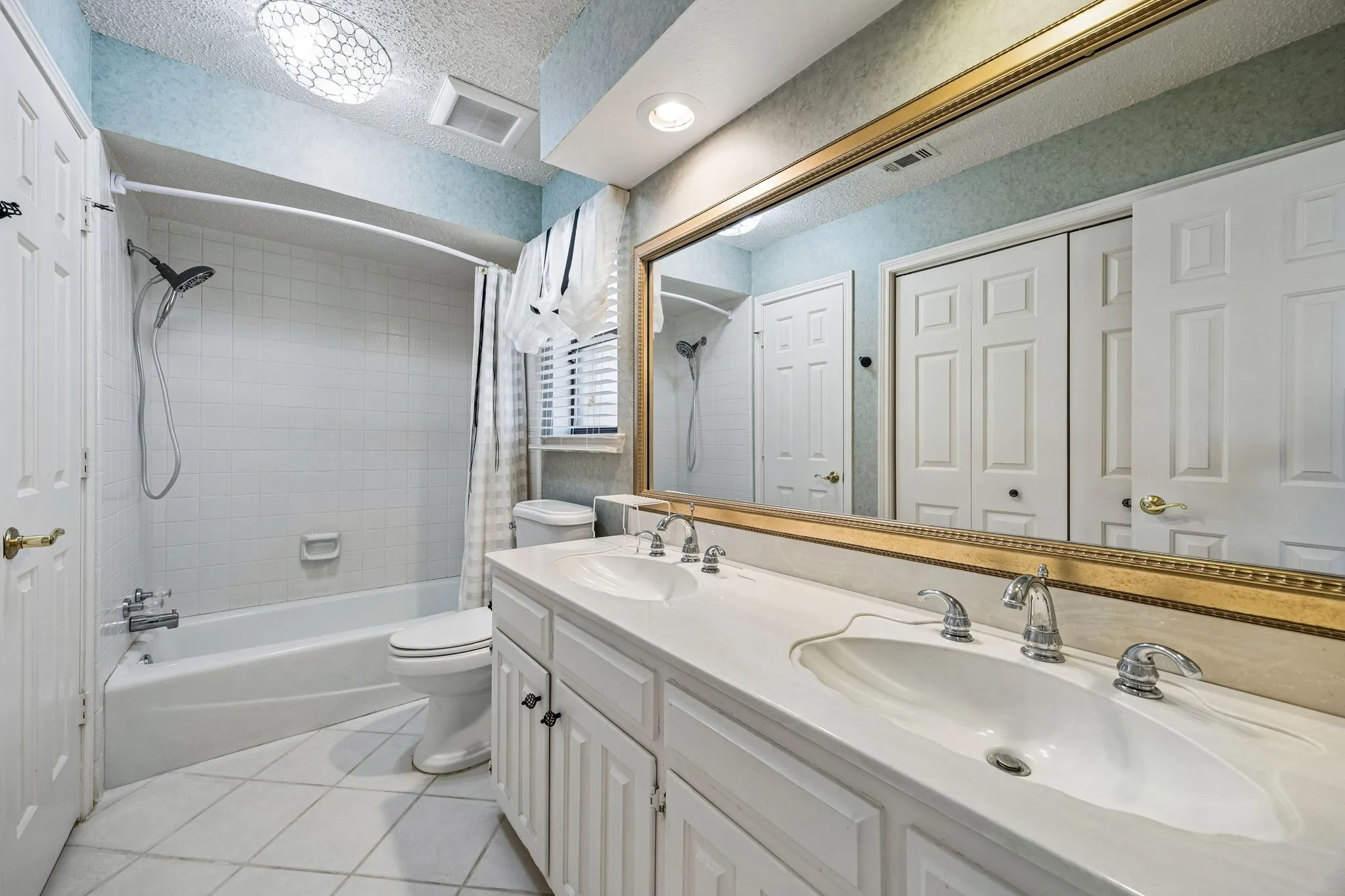 The Jack-n-Jill bathroom adjoins the second and third bedrooms.