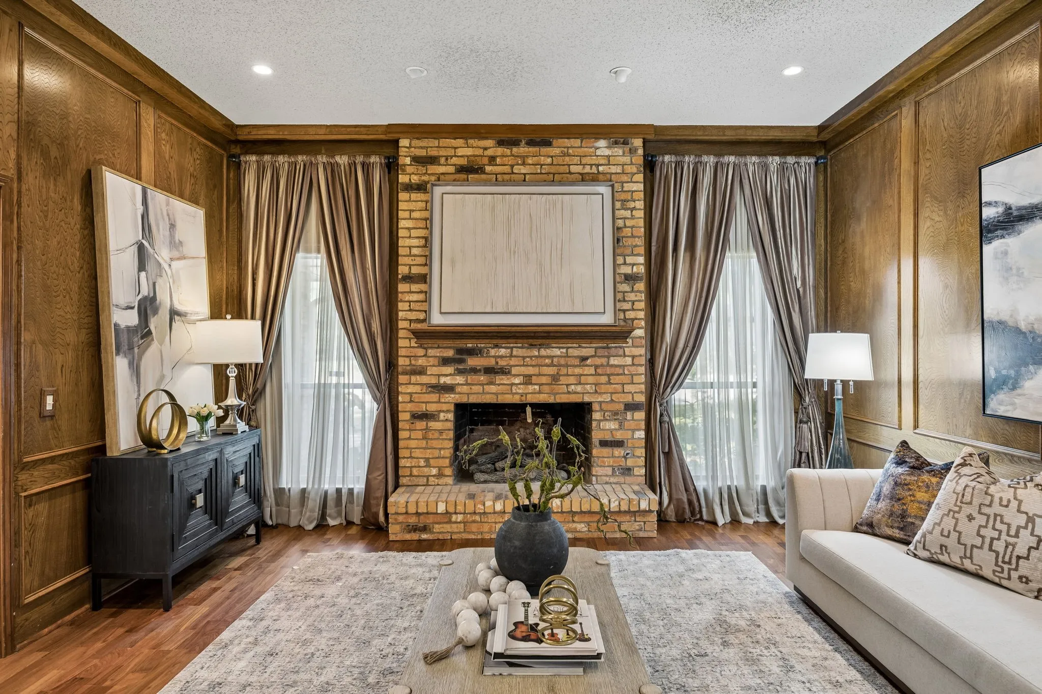 The living room fireplace is the focal point of this large living space.