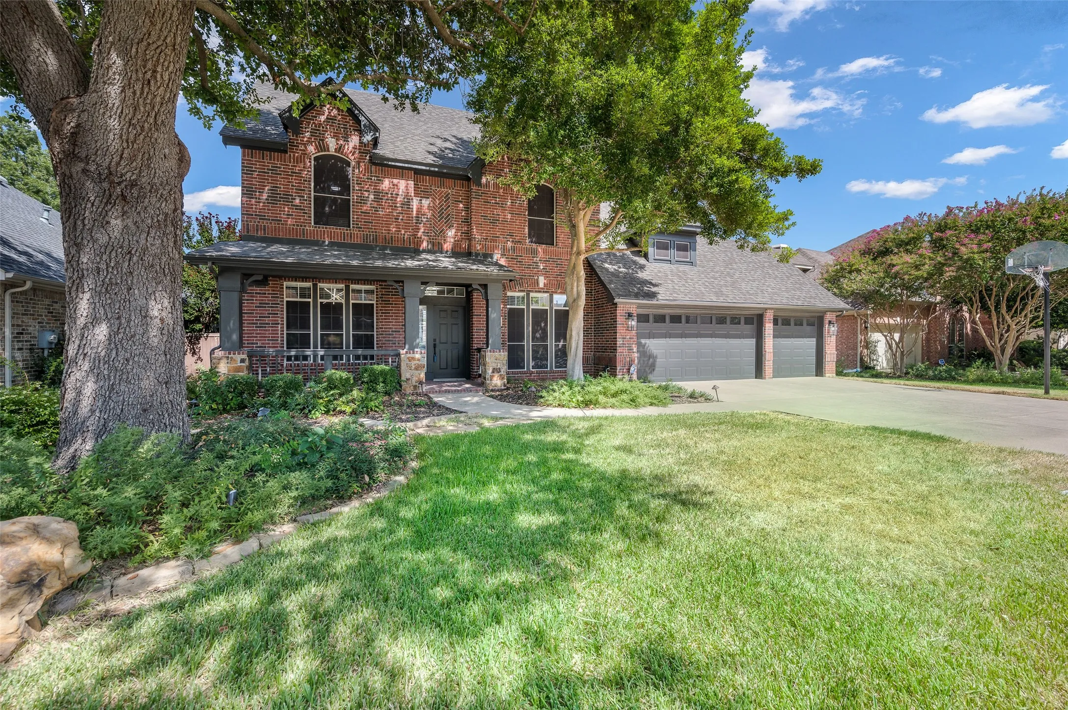 Beautiful curb appeal and front sitting porch.