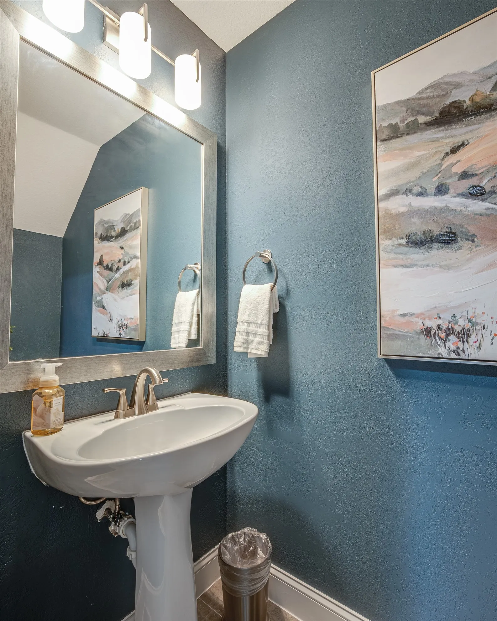 Stunning tile and fixtures in downstairs 1/2 bath.
