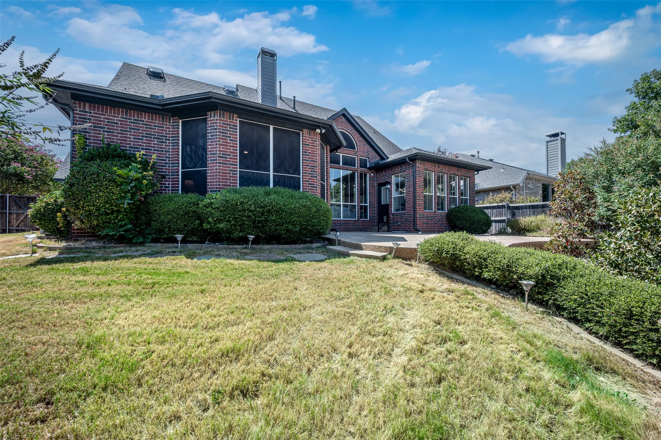 Large extended flagstone patio is a great spot for dining and entertaining.