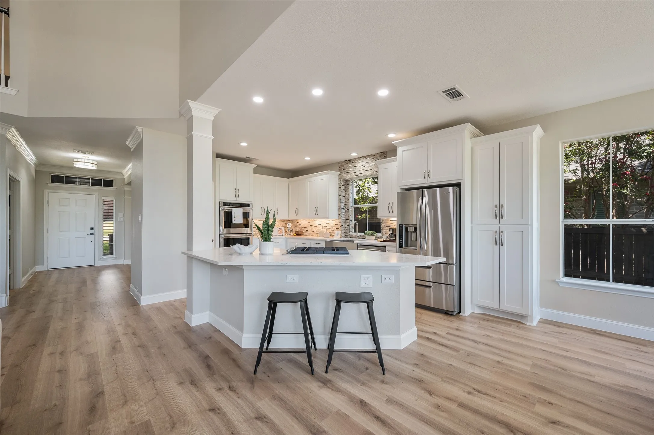 Beautiful updated Pergo Laminate Oak flooring and tall baseboards throughout most of the home.