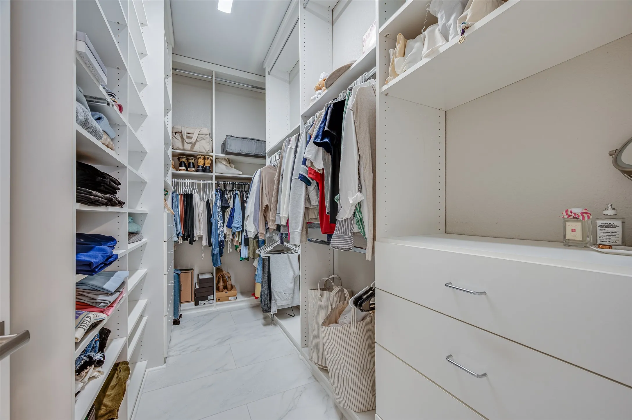 Nice custom closet system keeps everything organized.