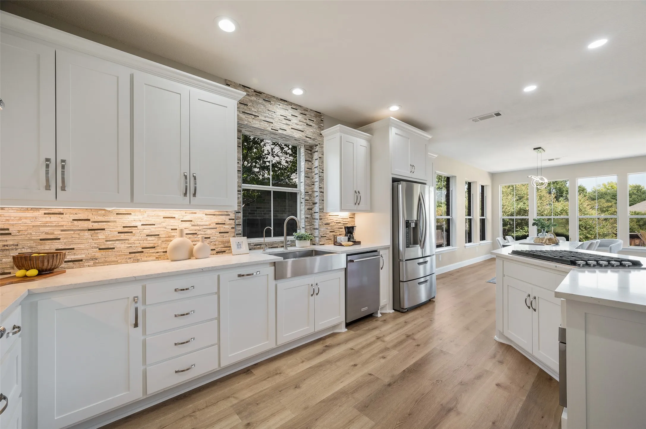 Stylish quartz counters and beautiful durable flooring.