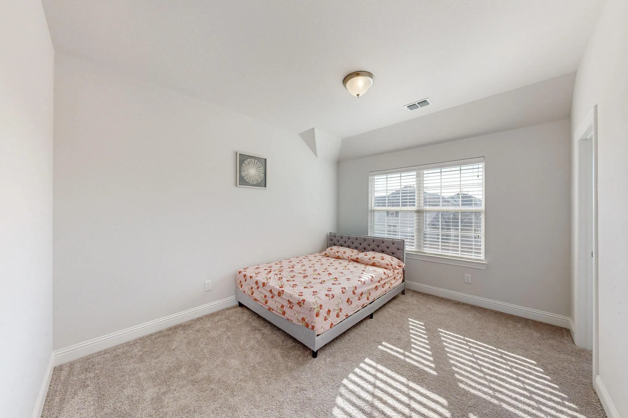 Bedroom featuring carpet flooring