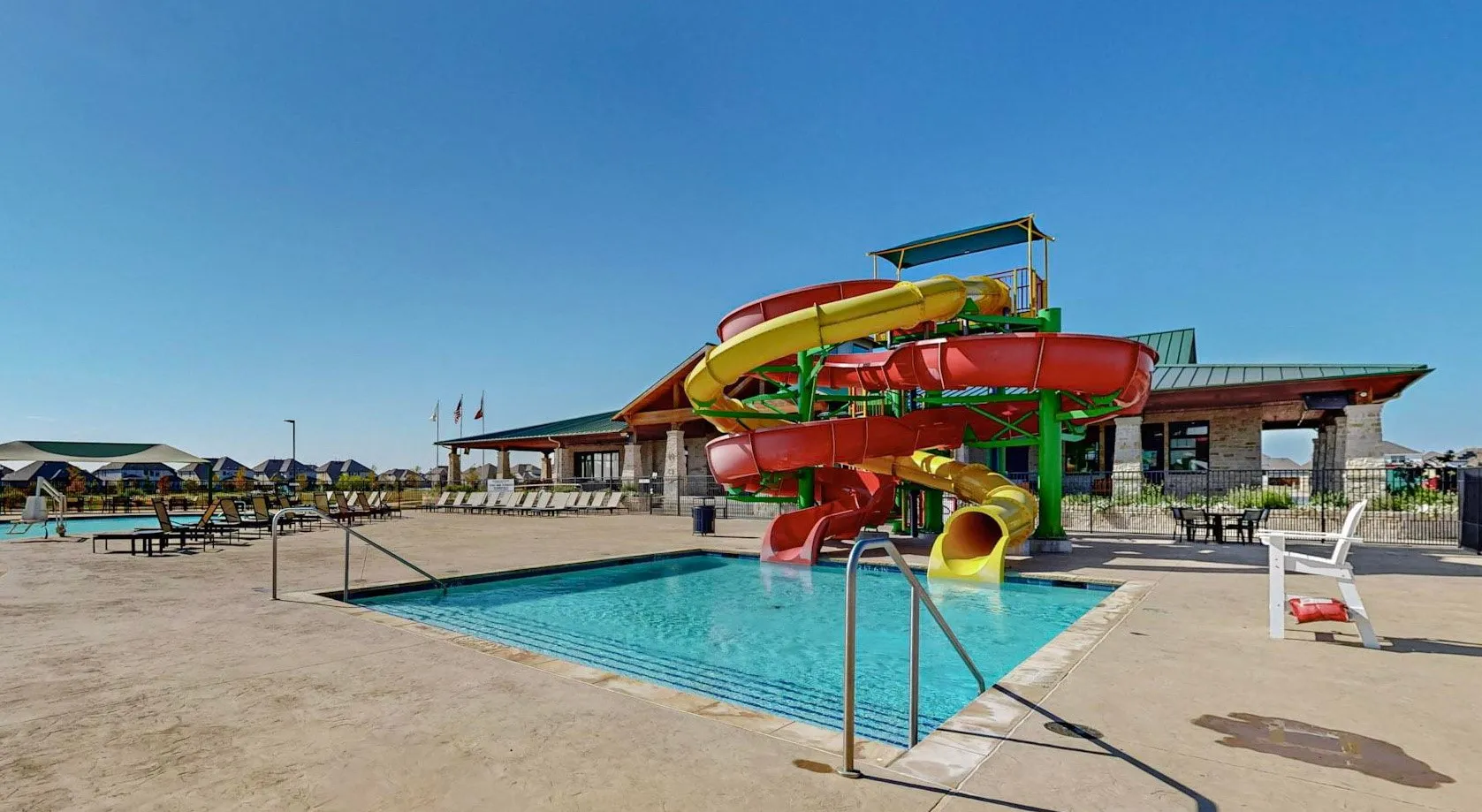 View of pool featuring a water slide