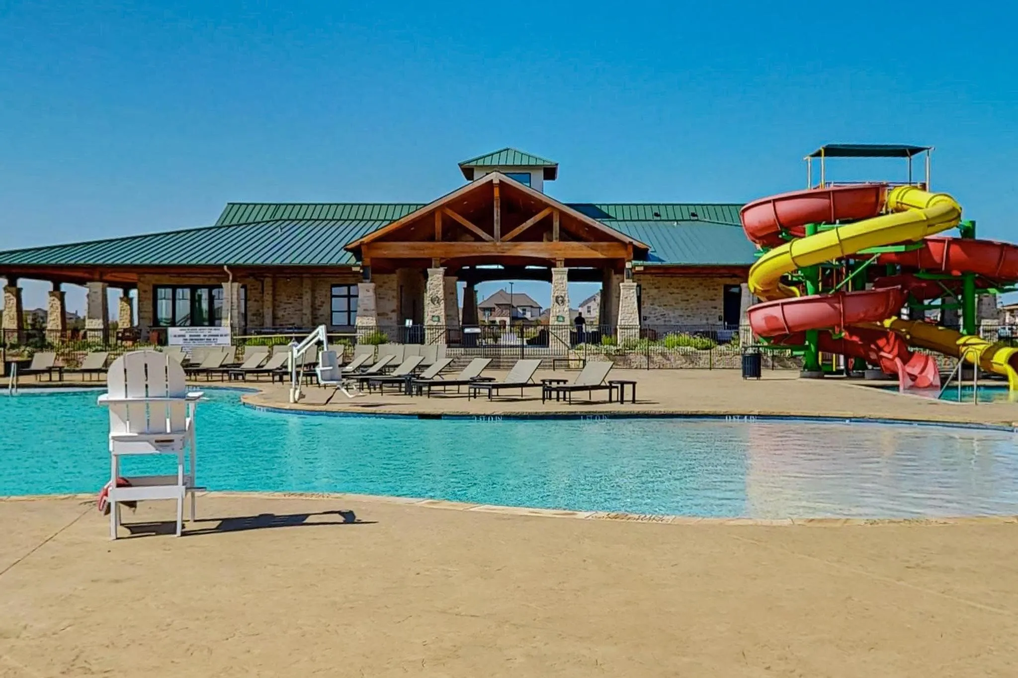 View of pool featuring a patio and a water slide