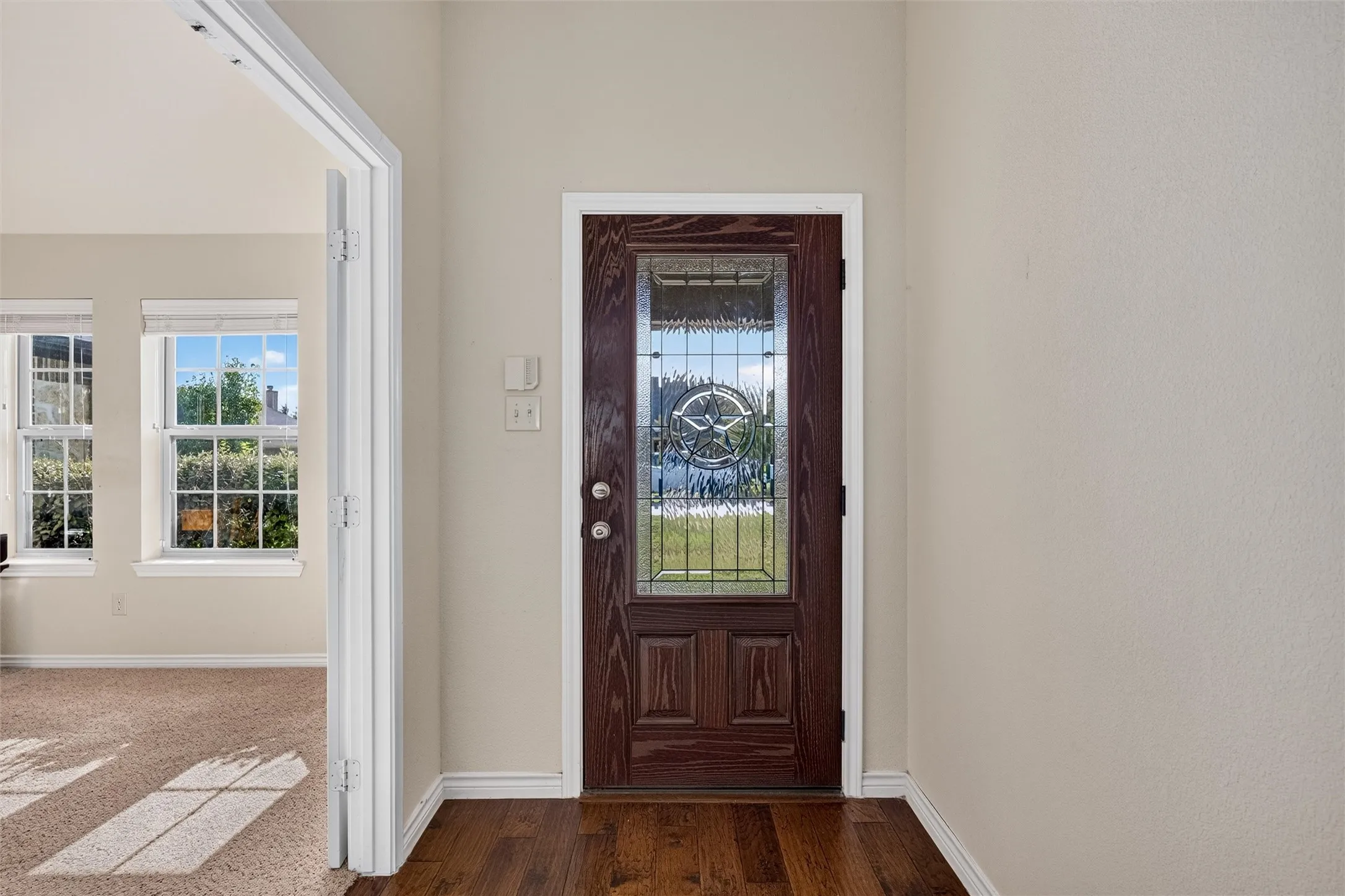 Front entry with wood floors and study!